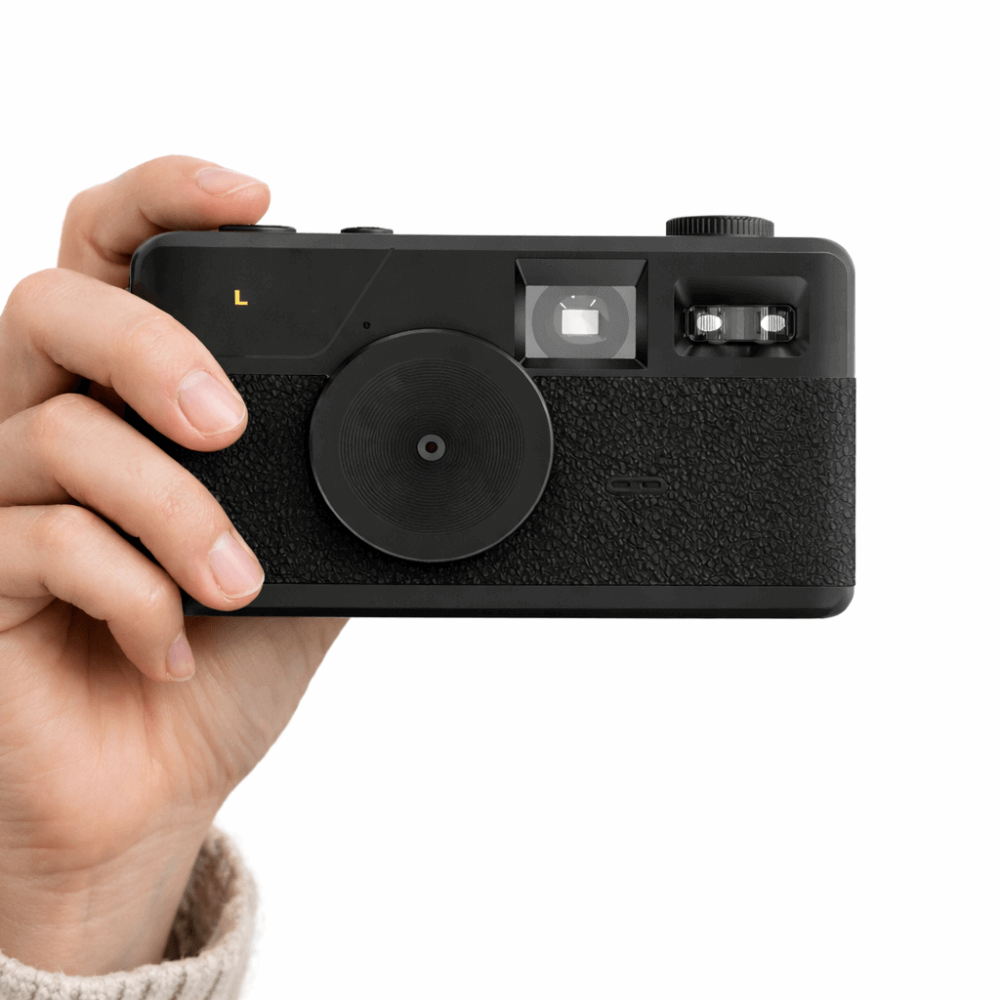 Moment kamera uden skærm i hånden – lifestyle foto